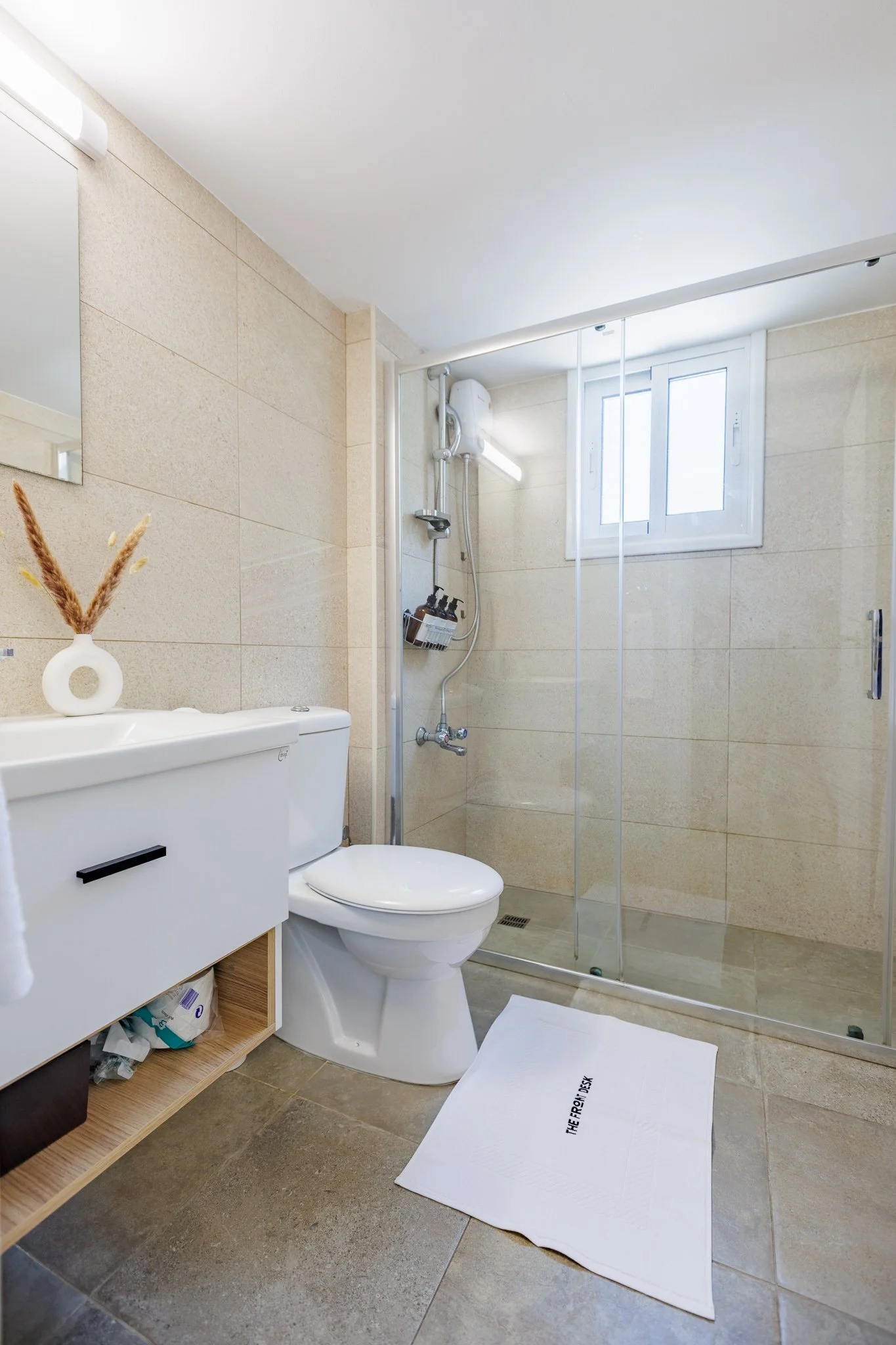 Antoinette Court — Vanity and shower