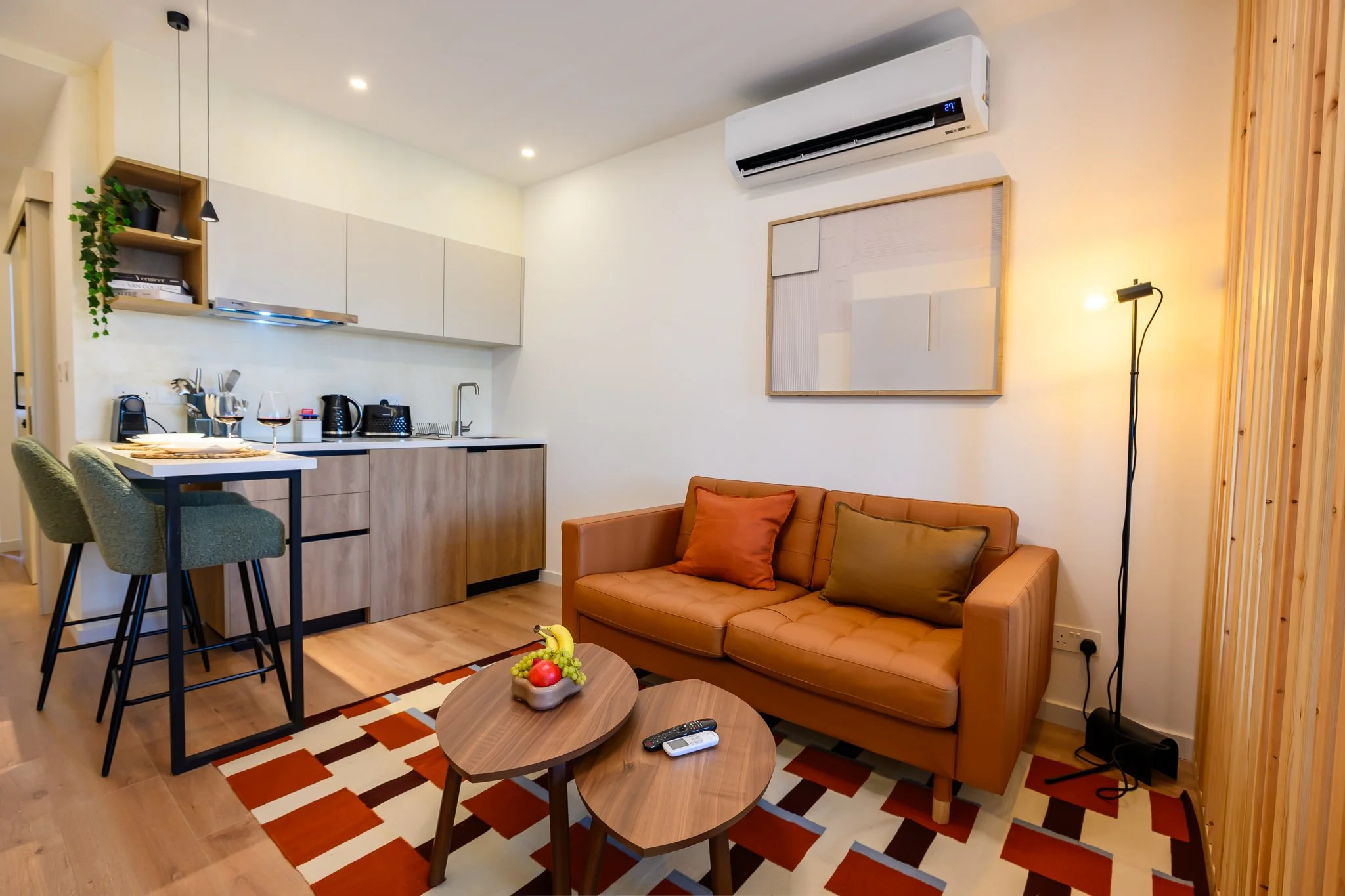 Nisia Junior Suite — From the sofa to the kitchen
