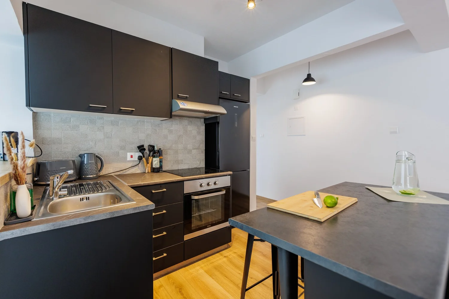 Antoinette Court — Cooking space and island