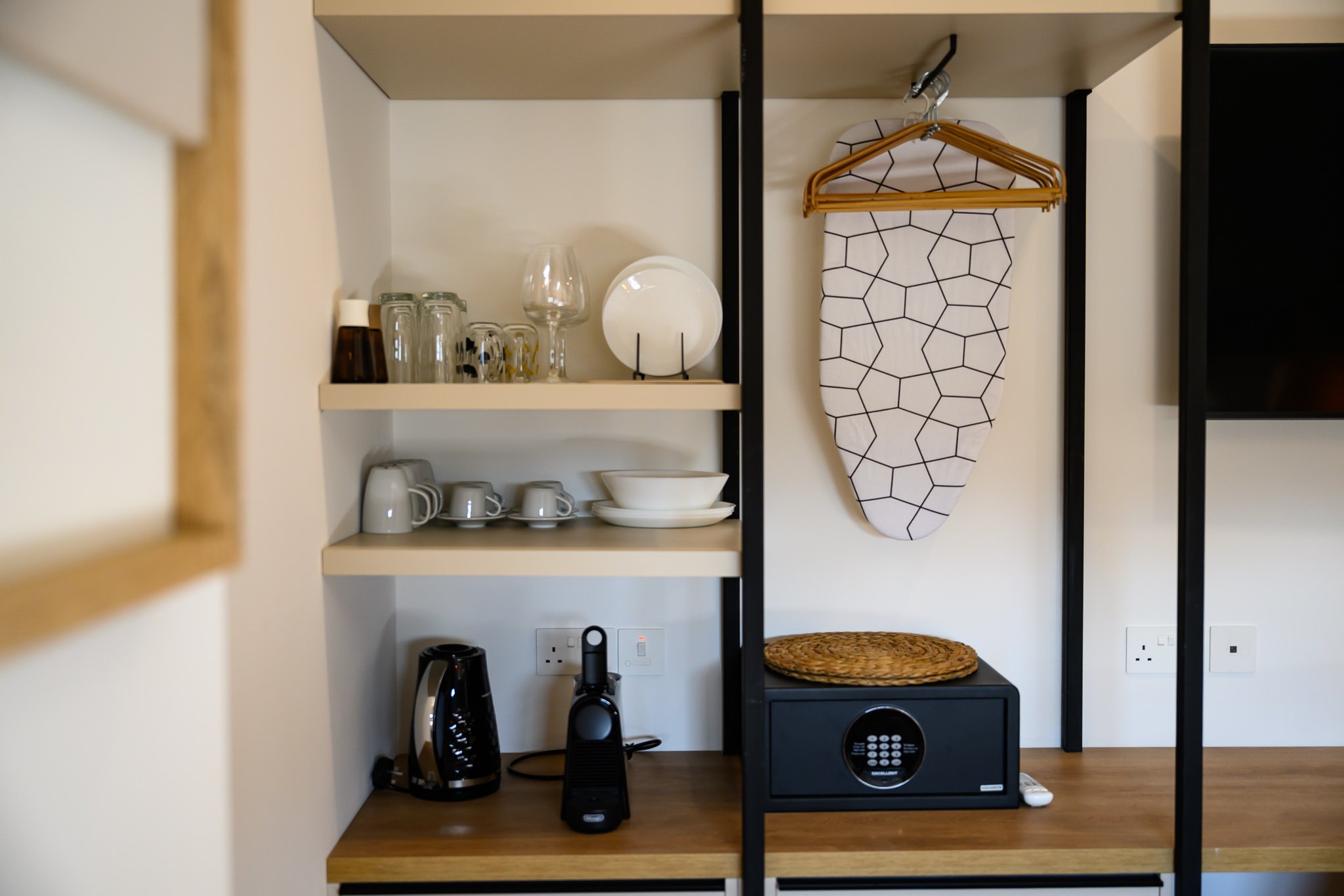 Nisia Classic Suite — Coffee corner and open wardrobe