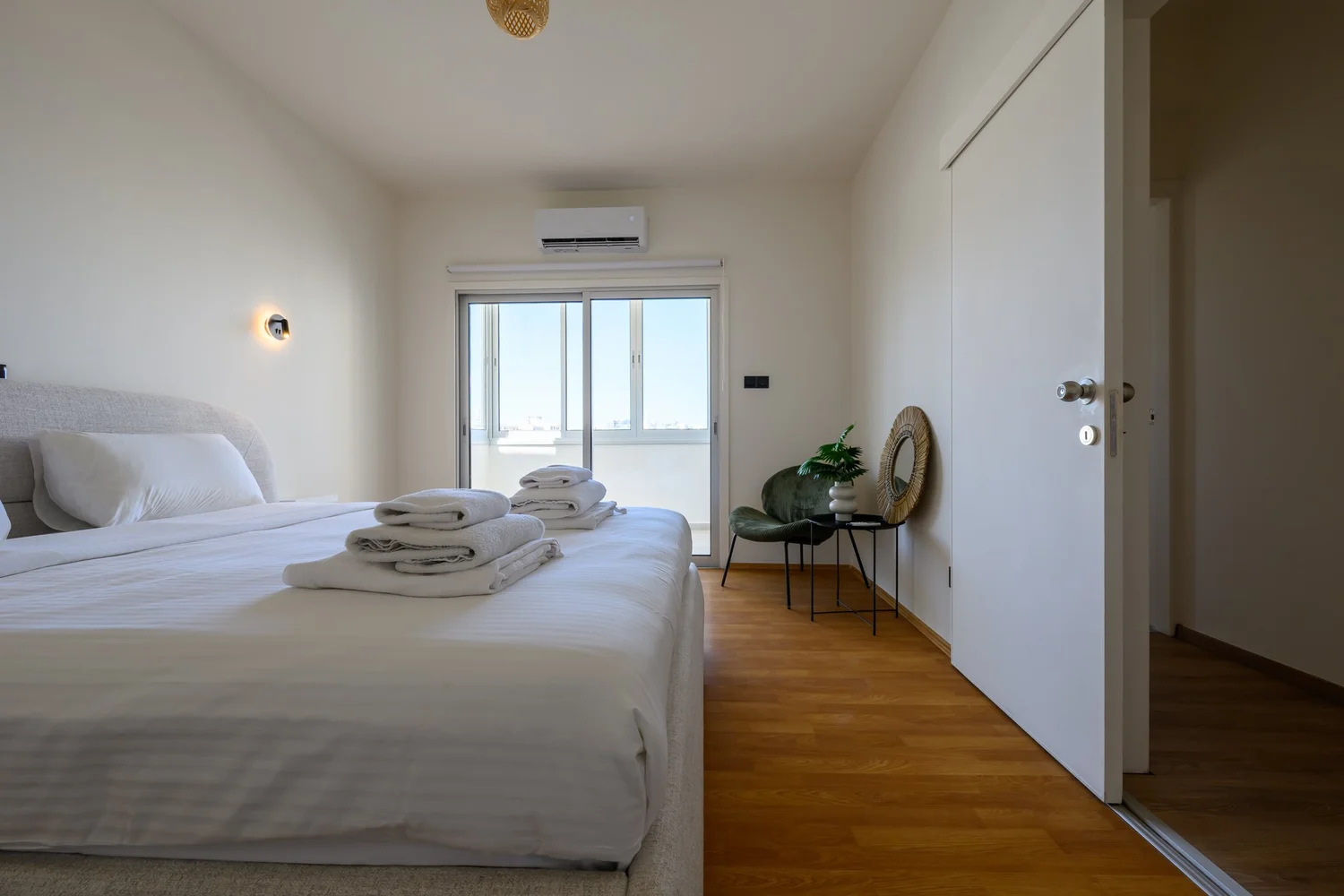Calian Court — Bedroom one — light from the balcony doors