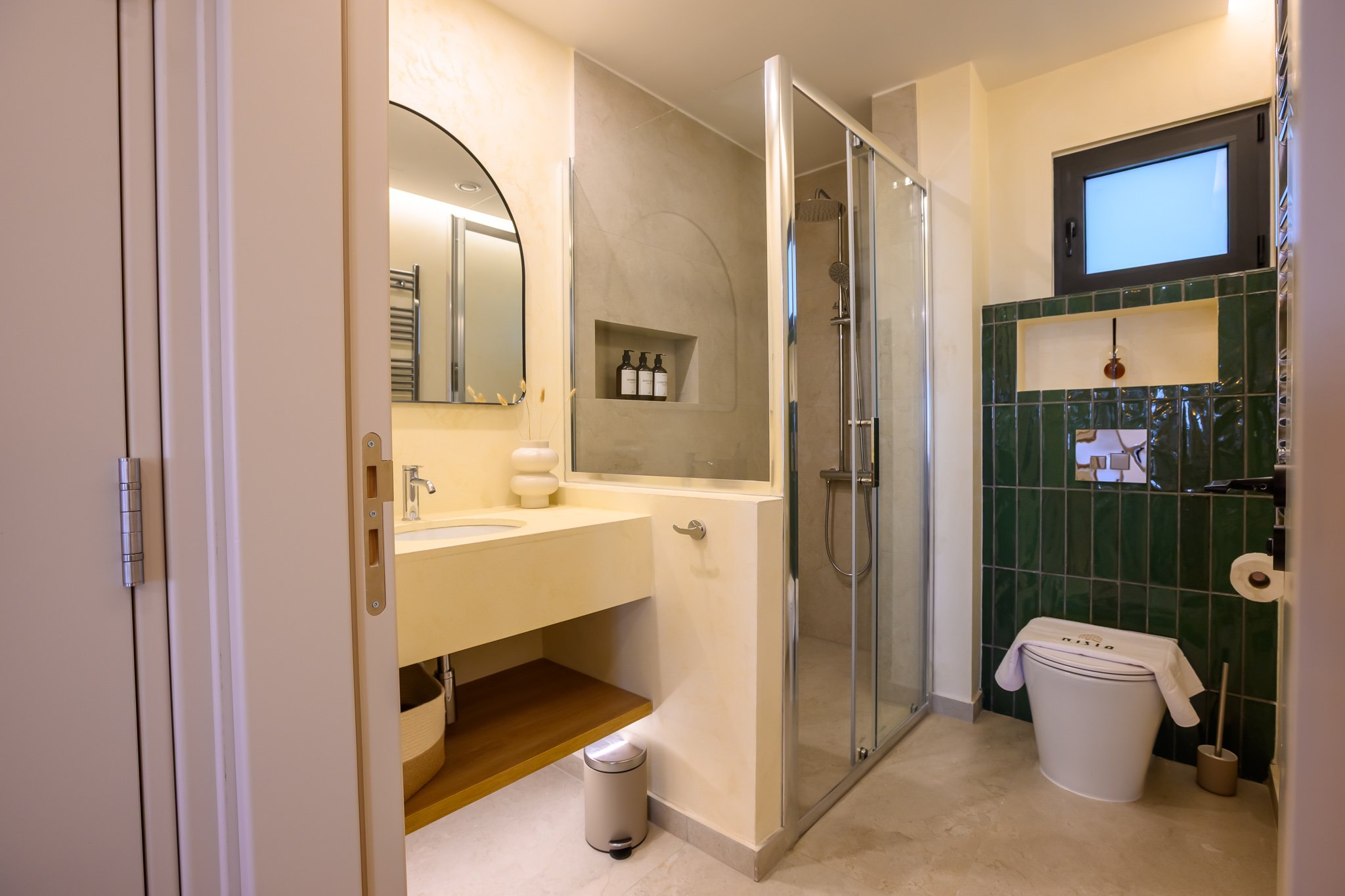 Nisia Signature Suite — Bathroom with walk-in rain shower