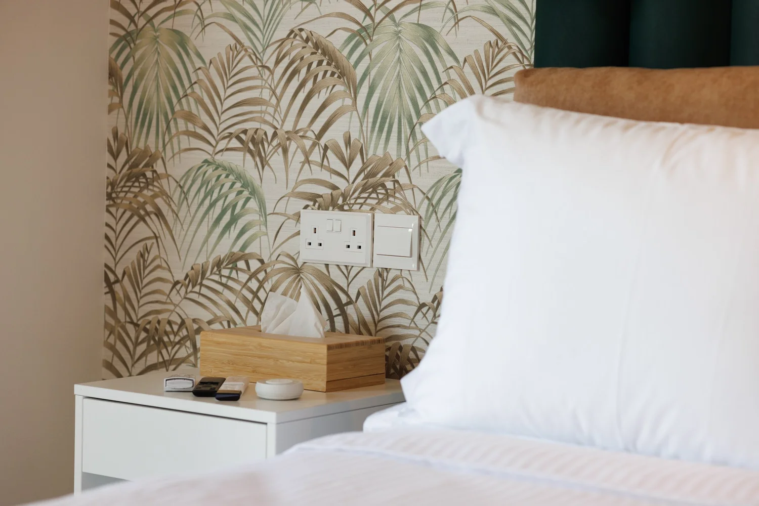 The Palm Suites Suite 2 — Bedside detail