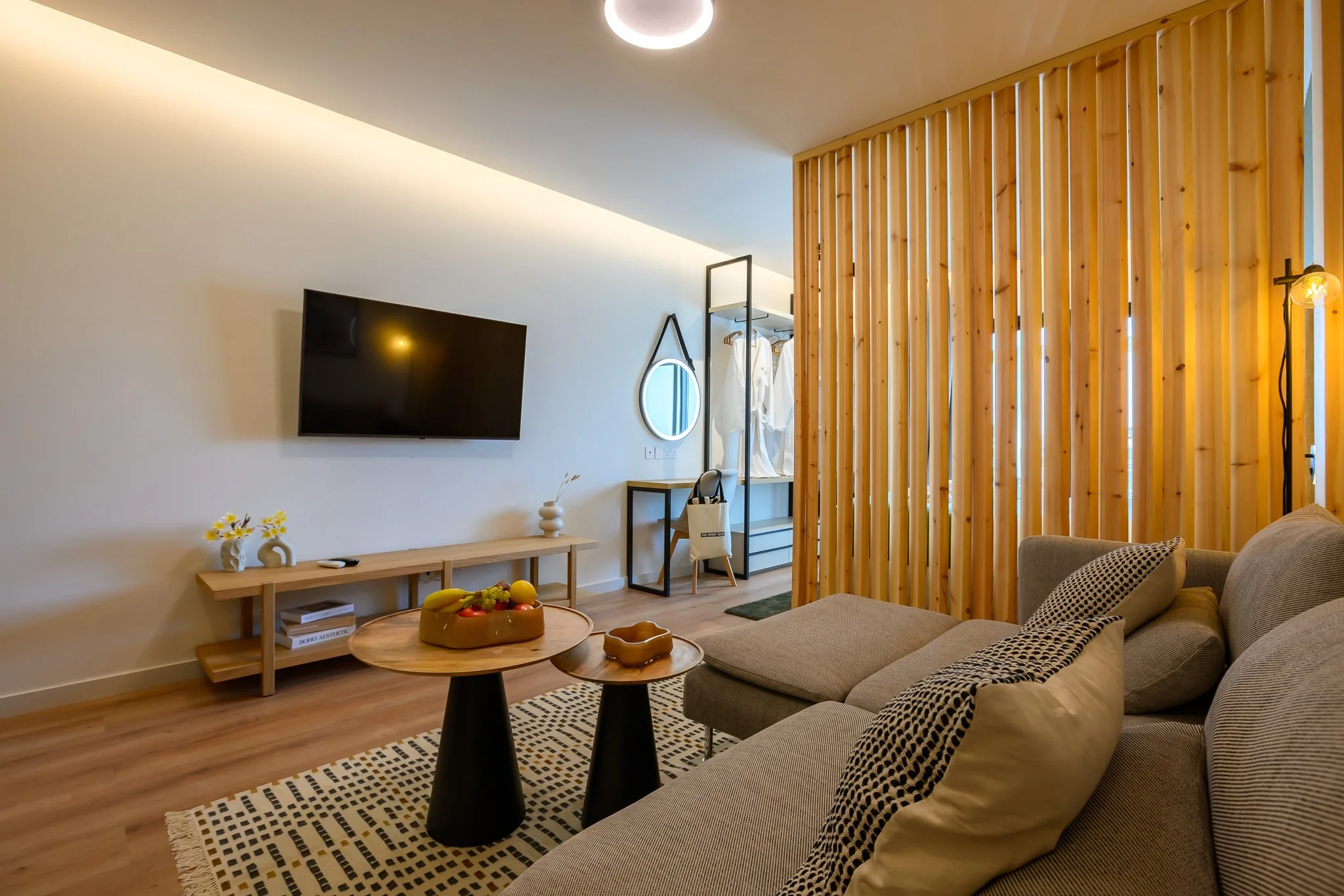 Nisia Signature Suite — Living area with Smart TV