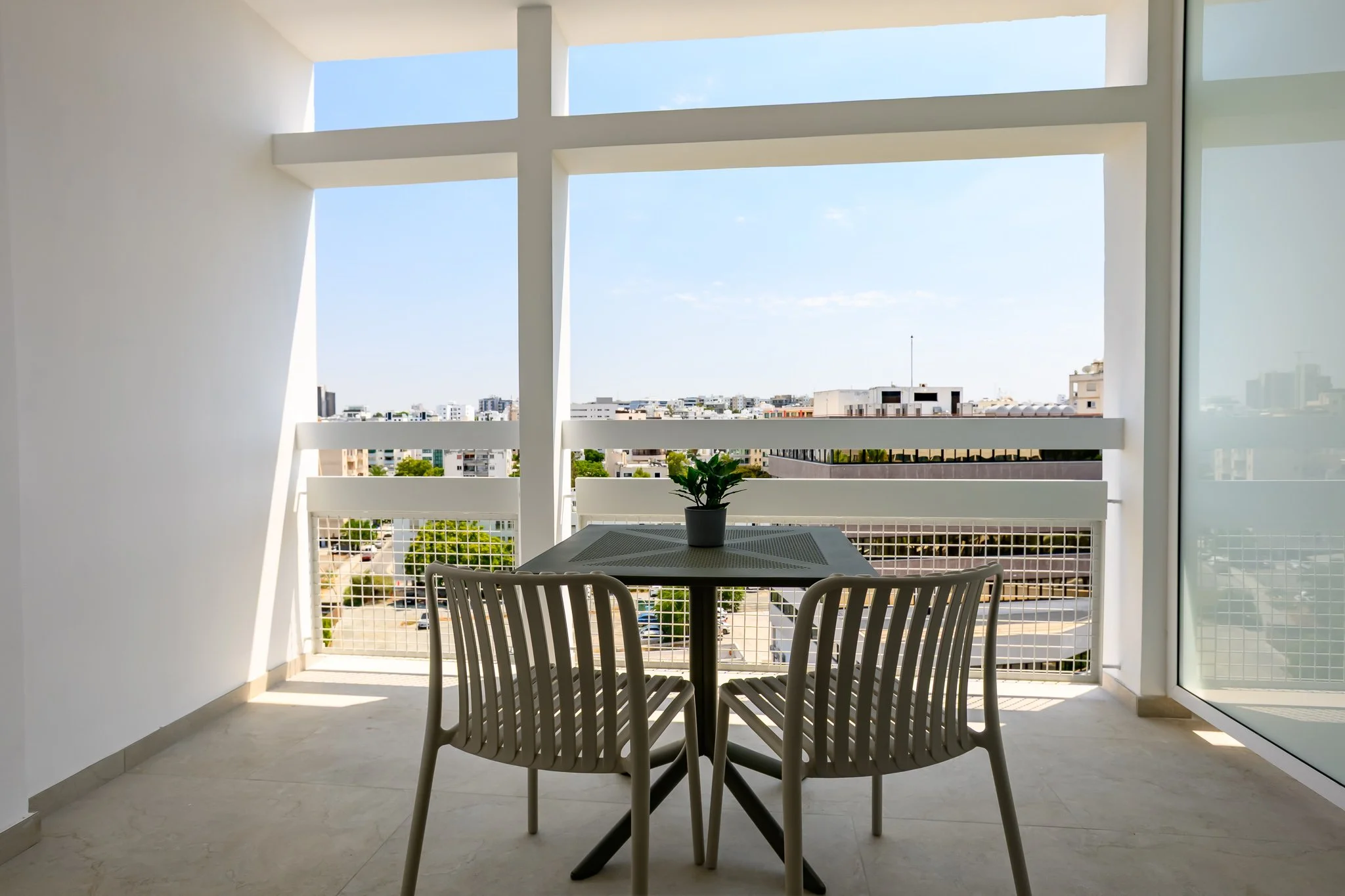 Nisia Suites — Private terrace with city views