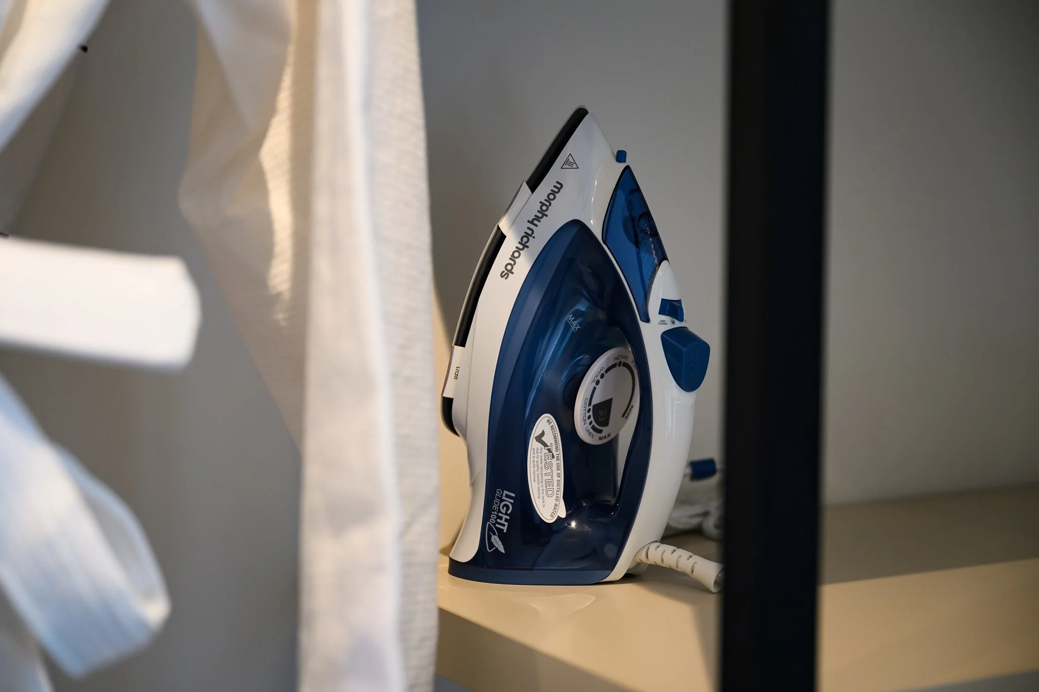 Nisia Junior Suite amenity — Iron and ironing board