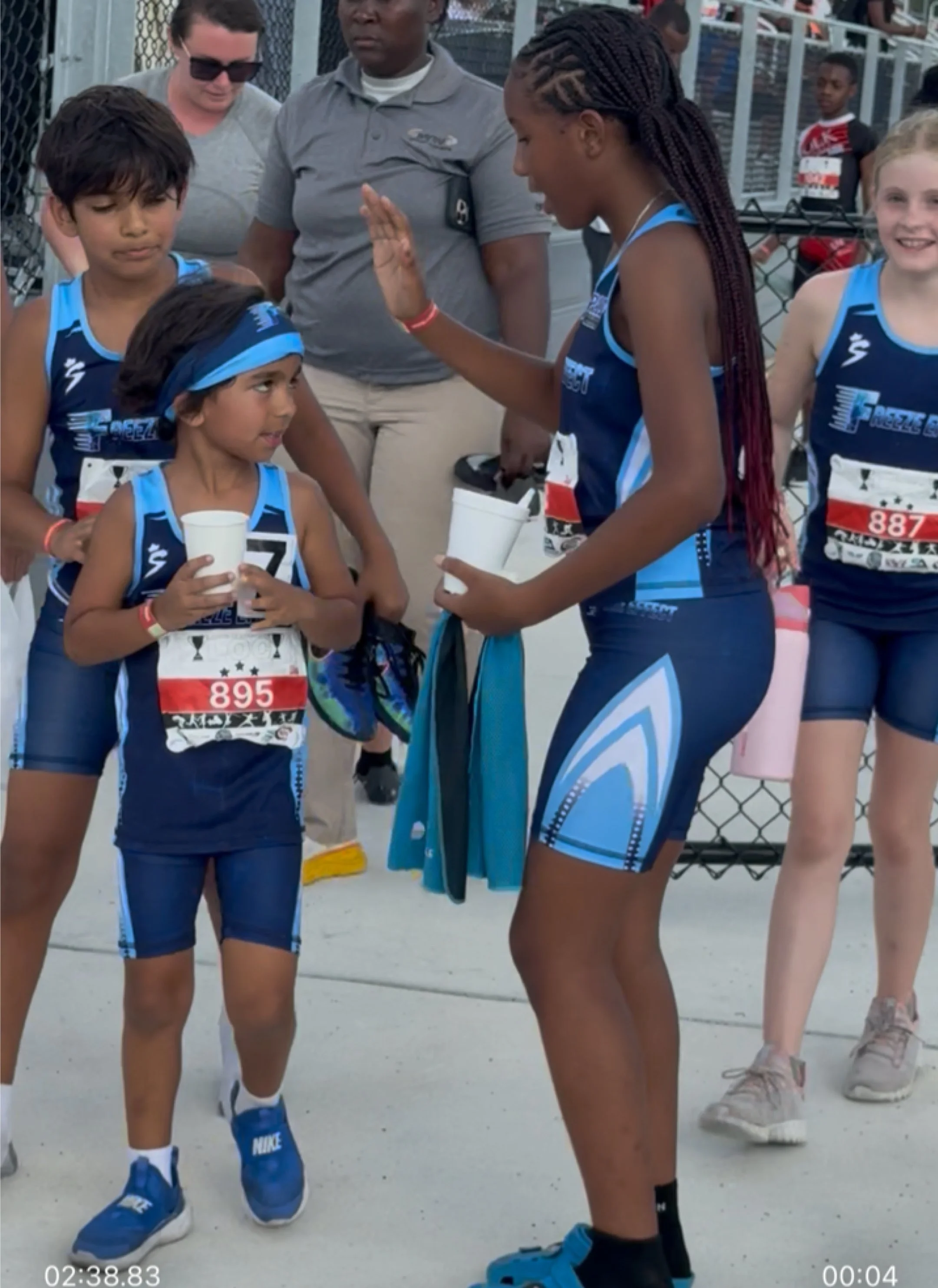 Athlete high-five after race
