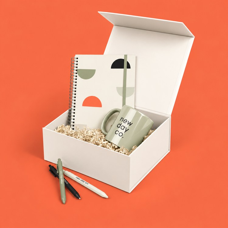 Branded gift box with notebook, mug and pens