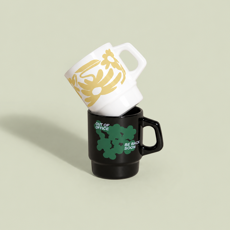 Stacked retro branded mugs