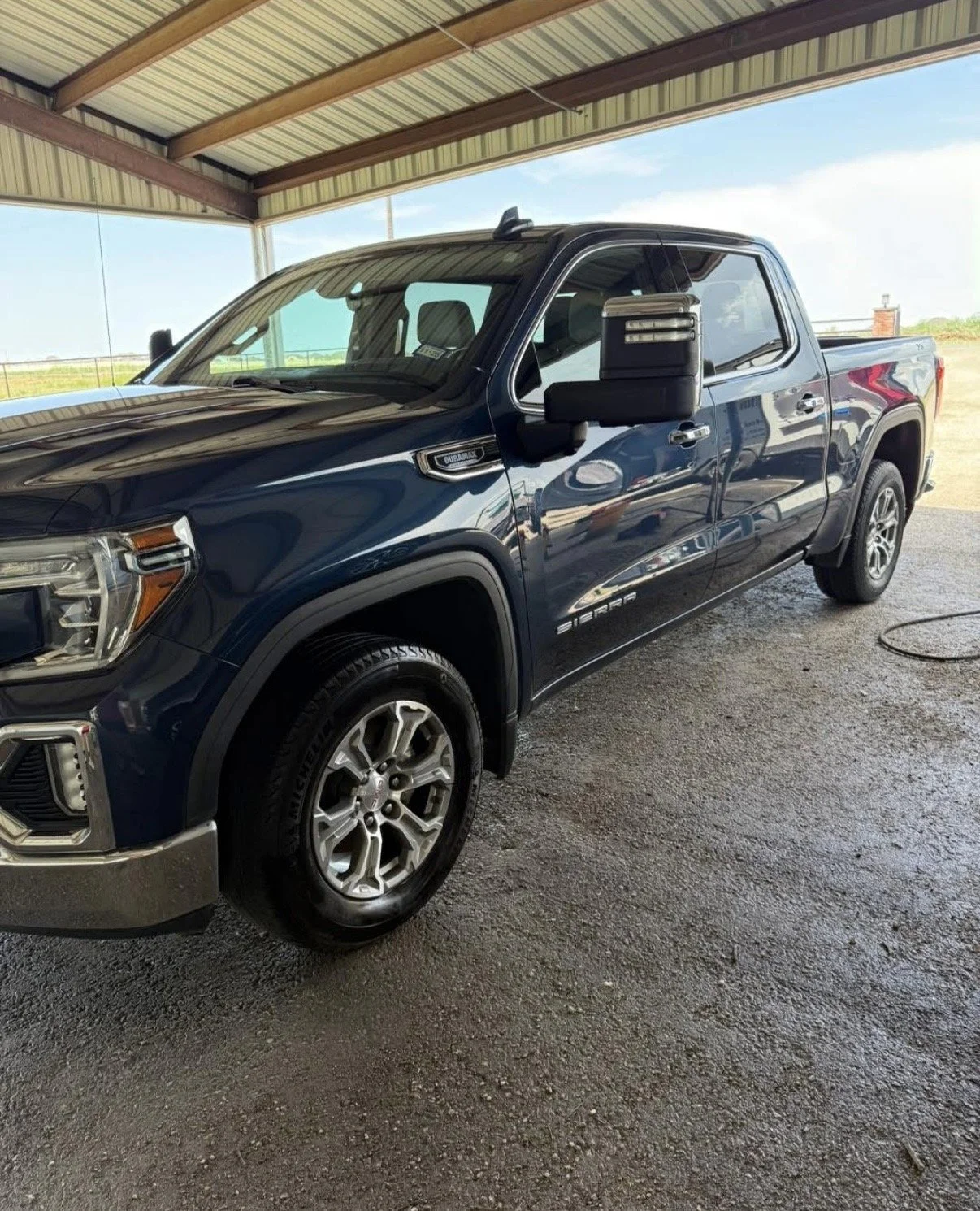 Car paint after decontamination and ceramic gloss enhancement