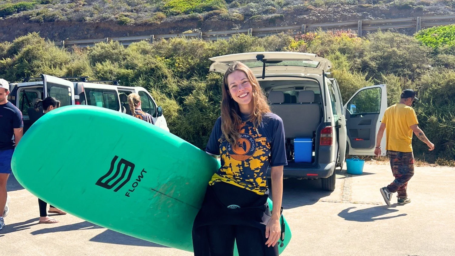 Girl surfing in Portugal