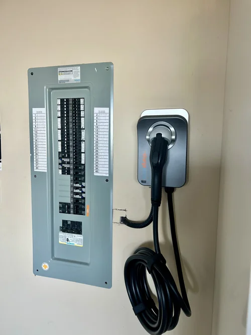 Level 2 EV charger connector with charge ring lit