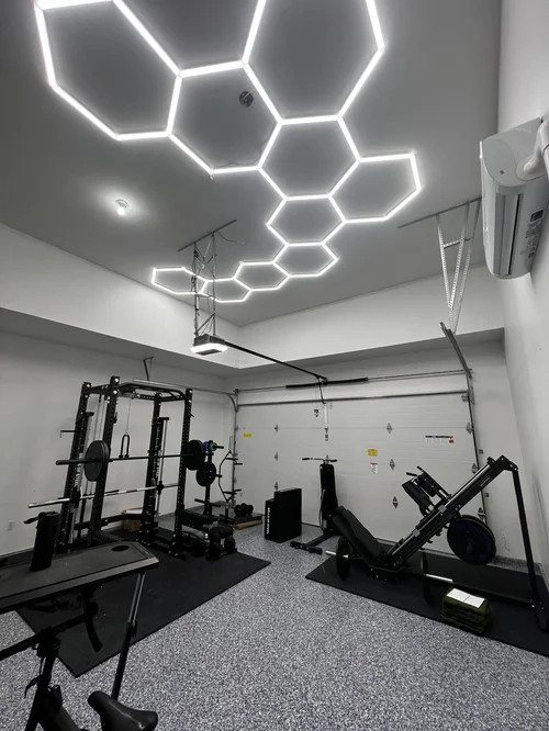 Hexagon LED lighting in a garage gym