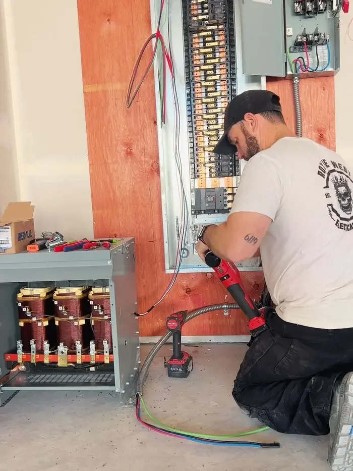 Josh wiring a distribution panel