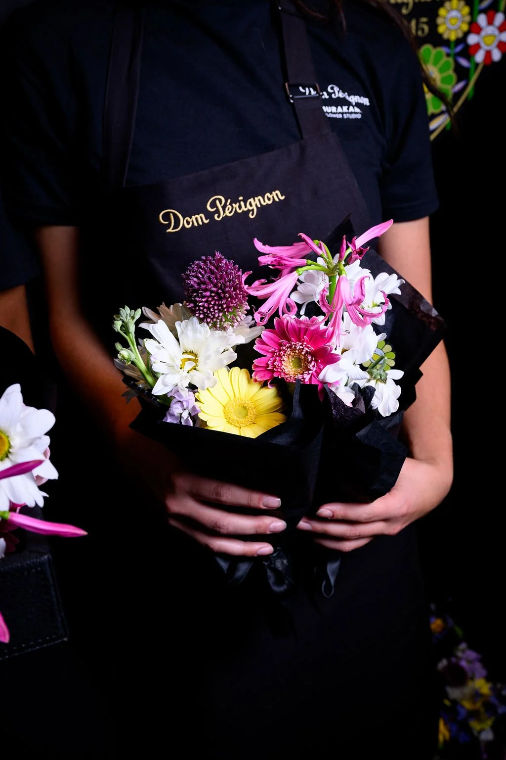 Brand ambassador wrapping bouquet