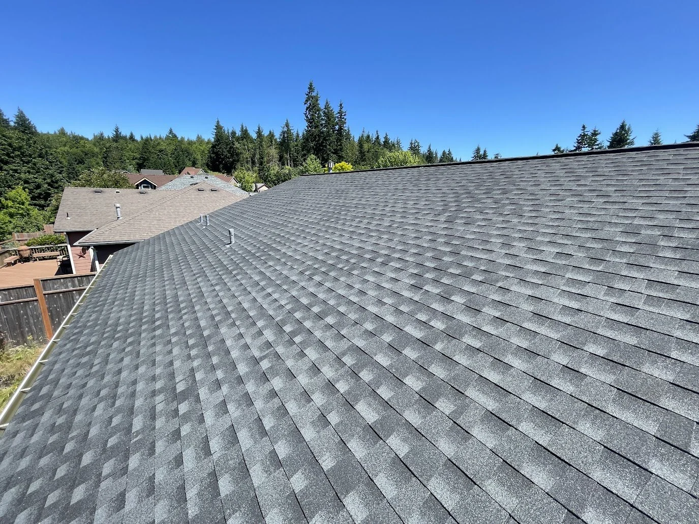 Completed GAF Charcoal HDZ roof by Topside Roofing and Siding