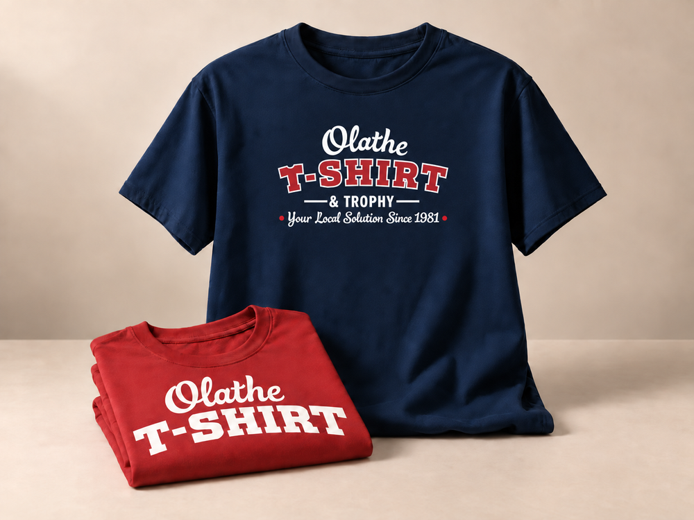 Navy and red T-shirts with Olathe T-Shirt & Trophy screen-print designs.