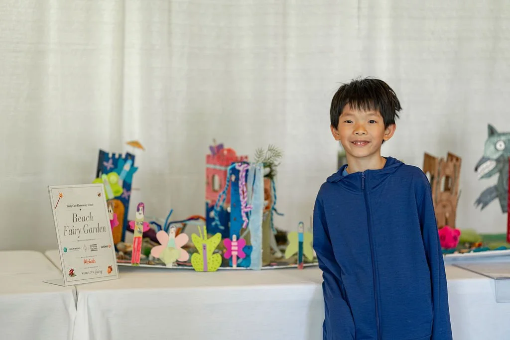 Student with fairy garden installation