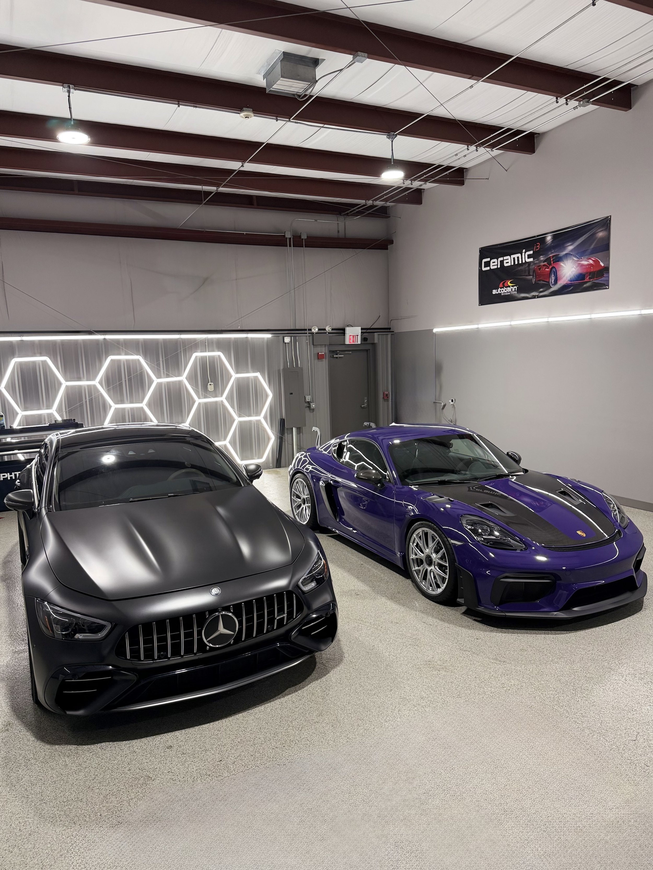 Two performance vehicles at PrimeVue Protection highlighting the care behind professional paint protection film installation
