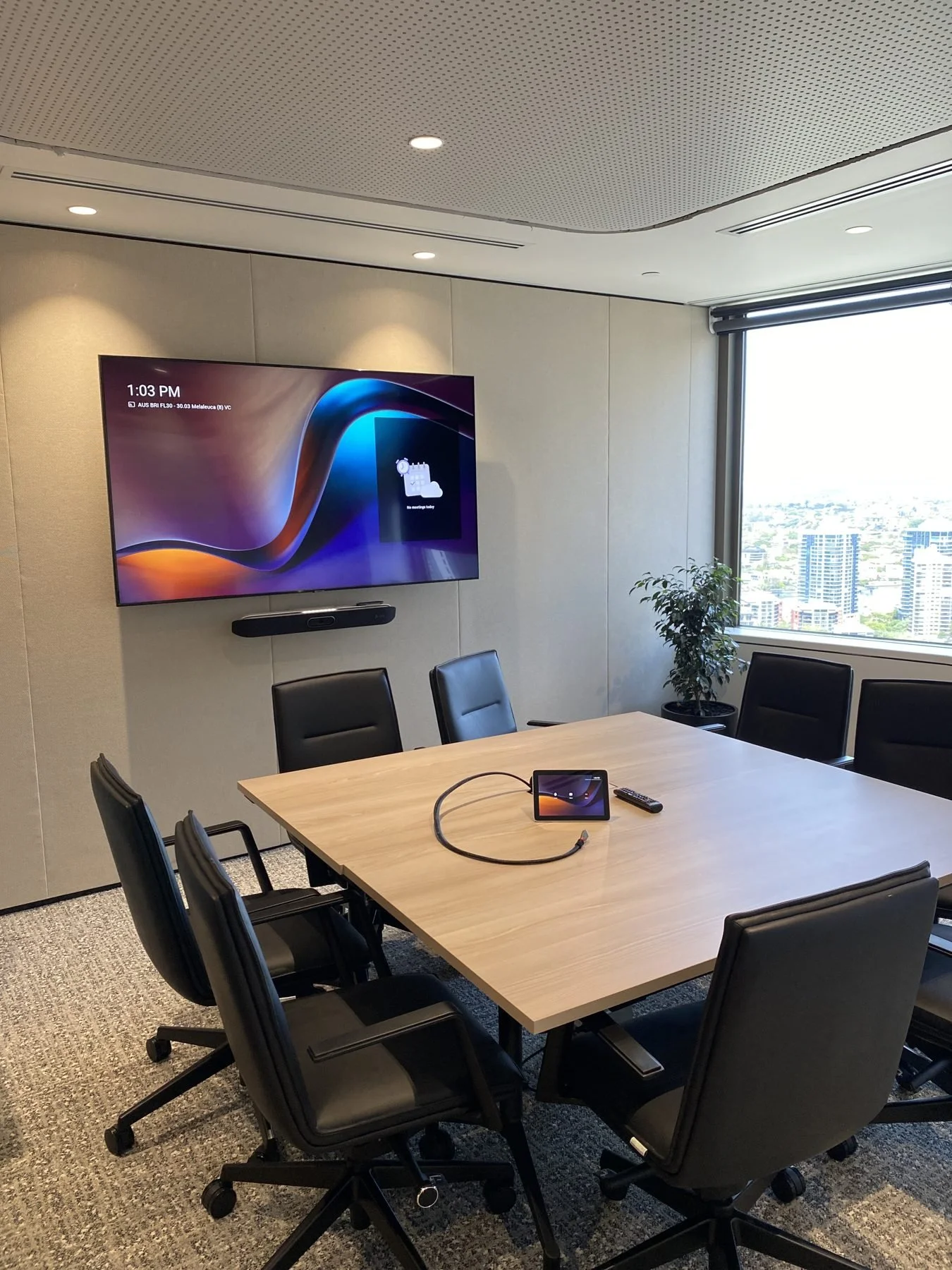 Microsoft Teams boardroom with city views, video conferencing installed in Brisbane CBD