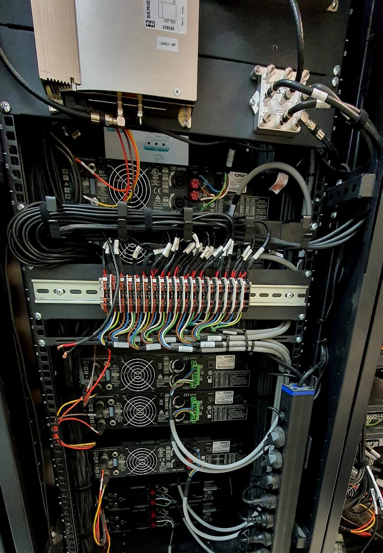 Structured cabling rack with patch panels and network switches terminated and tested in Brisbane