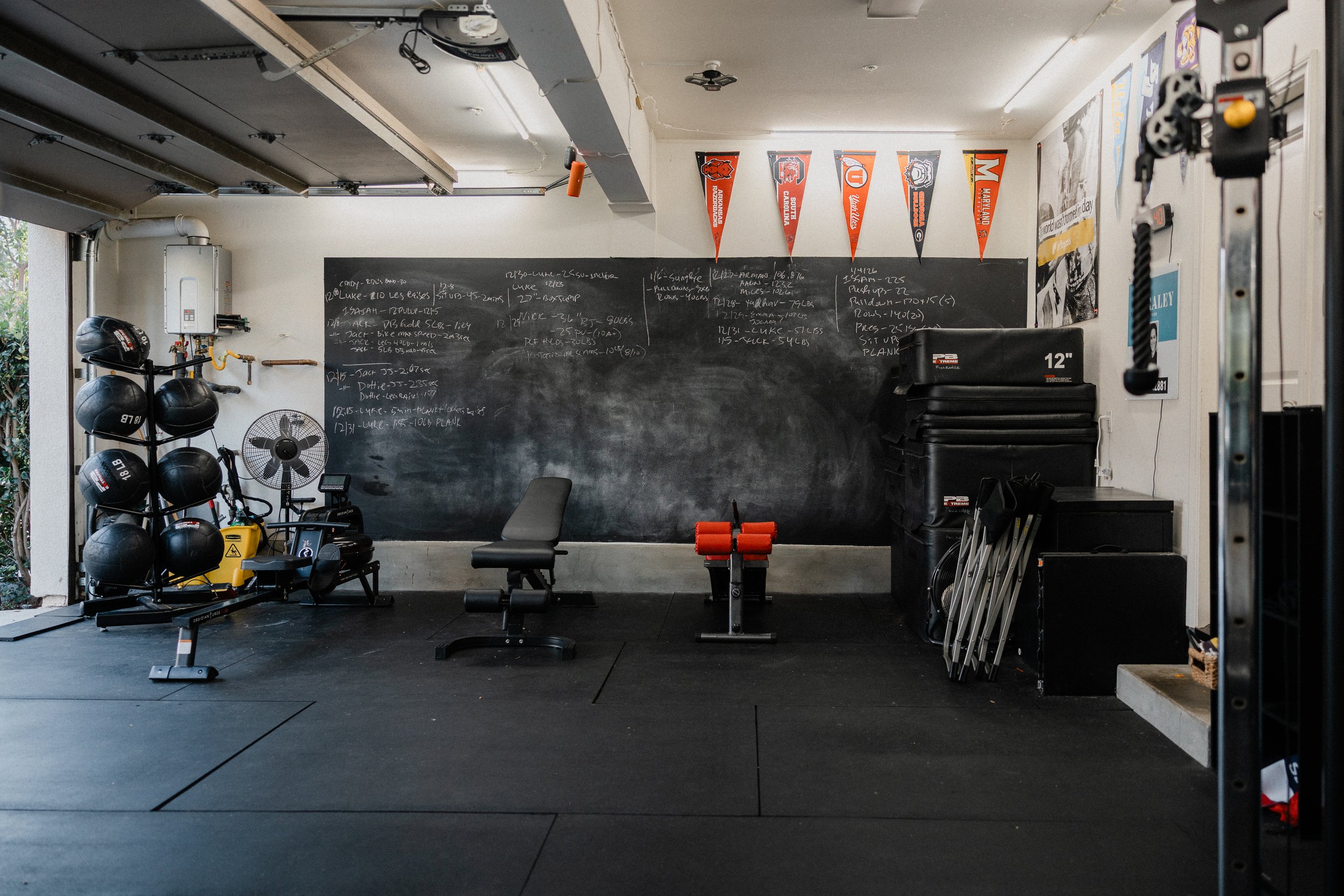FullRange Athletics training floor with chalkboard and equipment