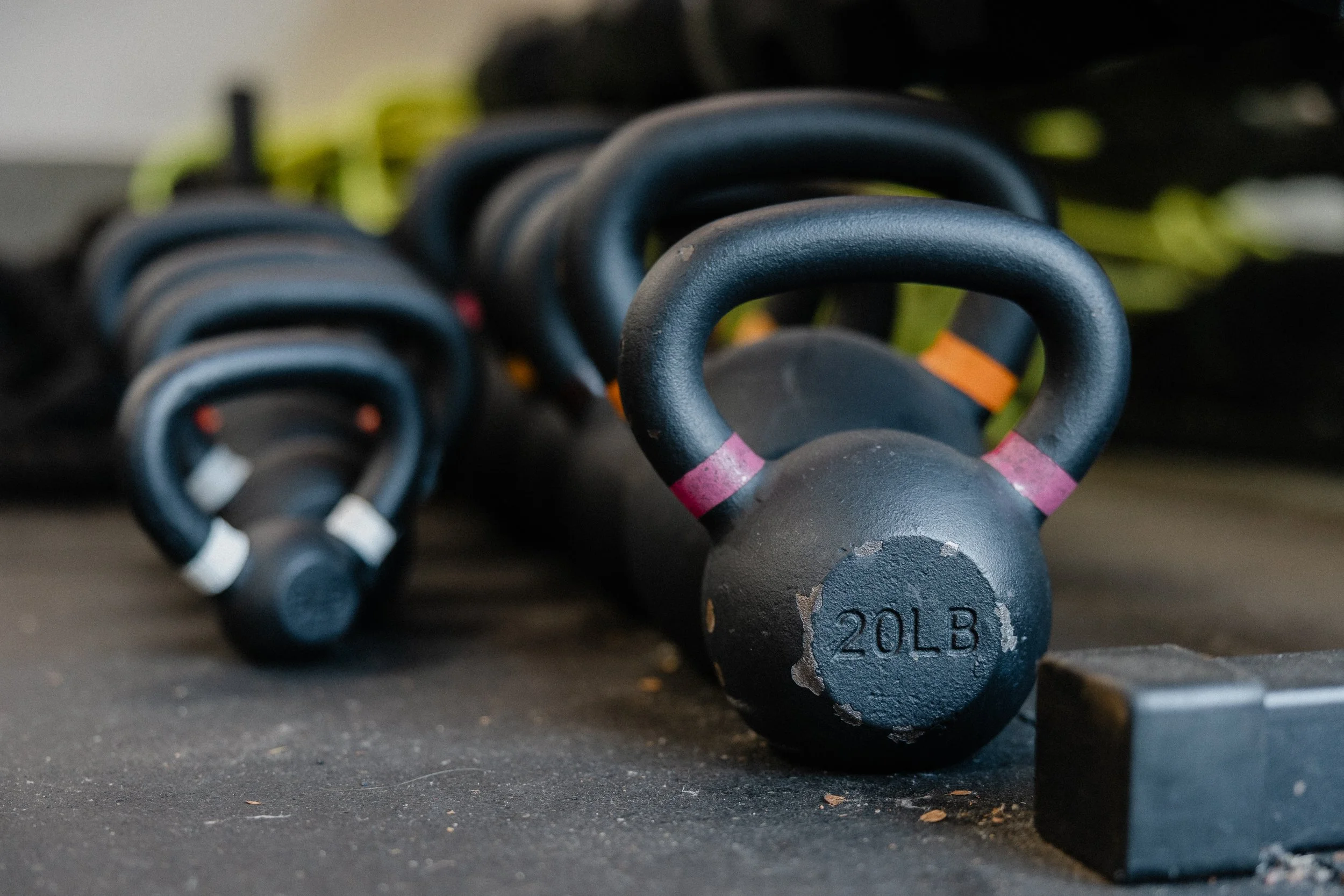 Kettlebells lined up at FullRange Athletics private gym Irvine