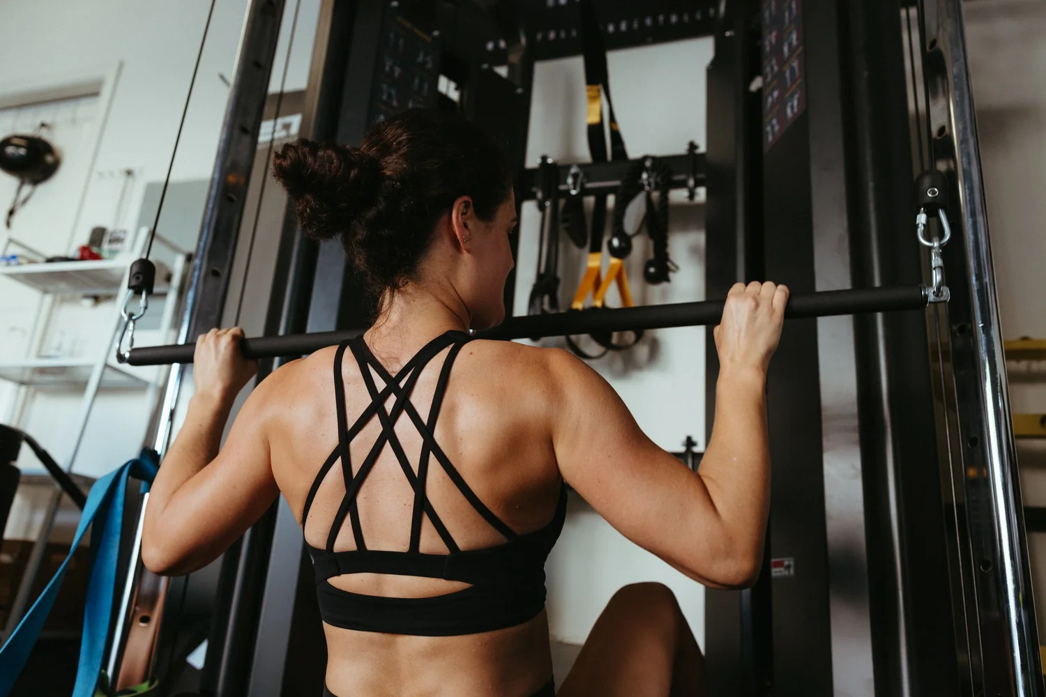 Venya coaching a client in the FullRange gym