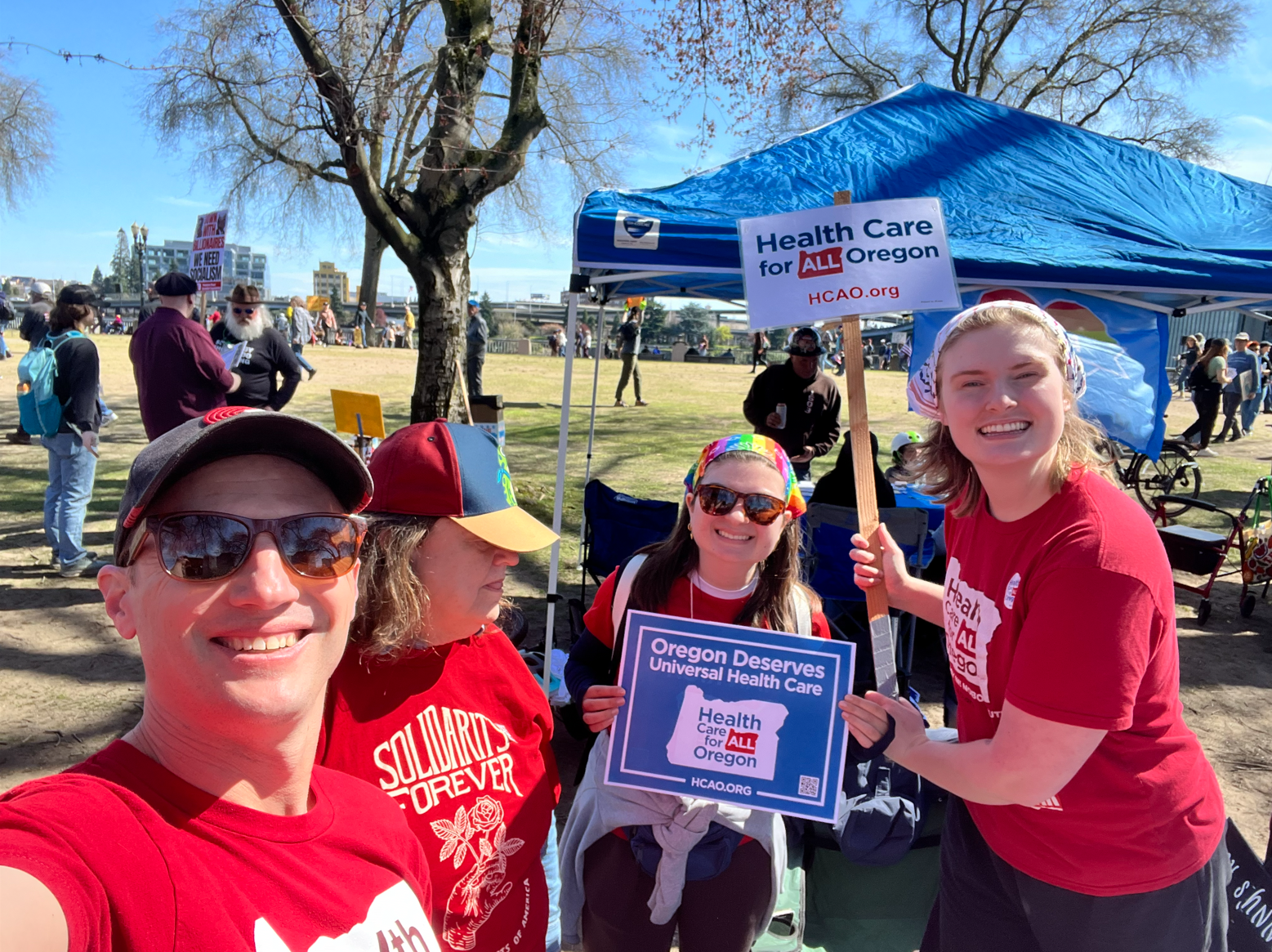 Chapter members holding signs at advocacy action