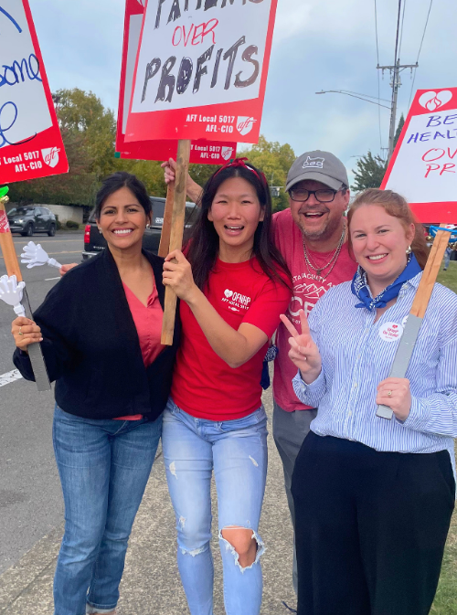 HCAO members holding signs