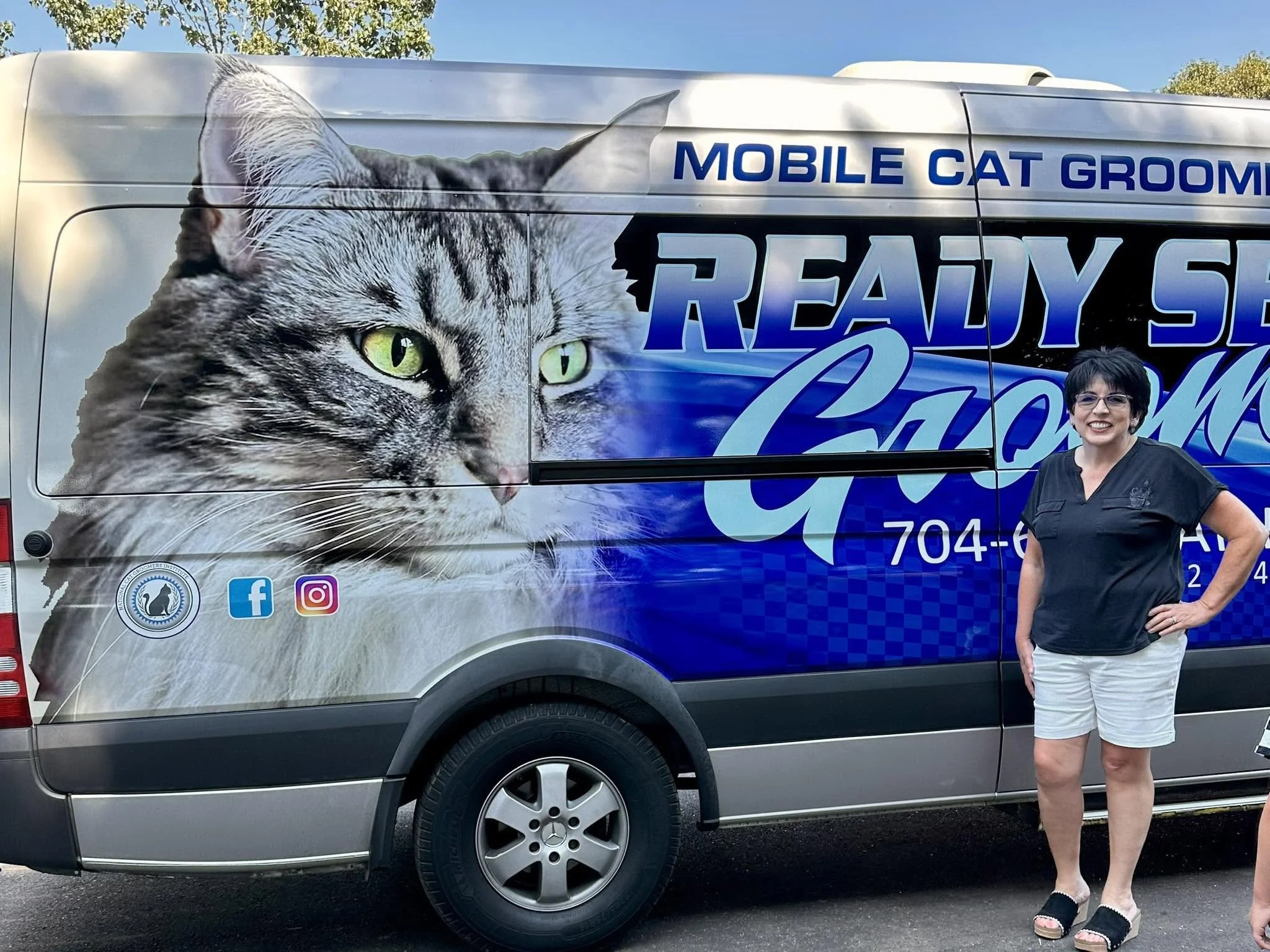 The Ready Set Groom mobile cat-grooming van, parked and ready.