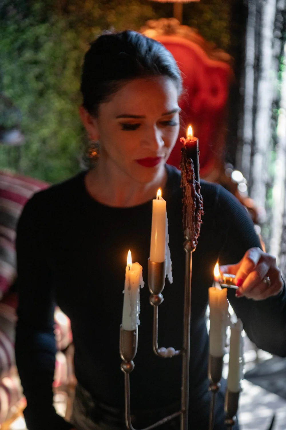Liz lit by candlelight