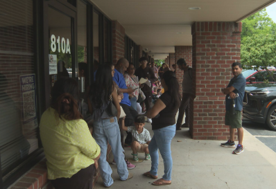 Drivers waiting outside Kernersville DMV on N Main St in June 2025