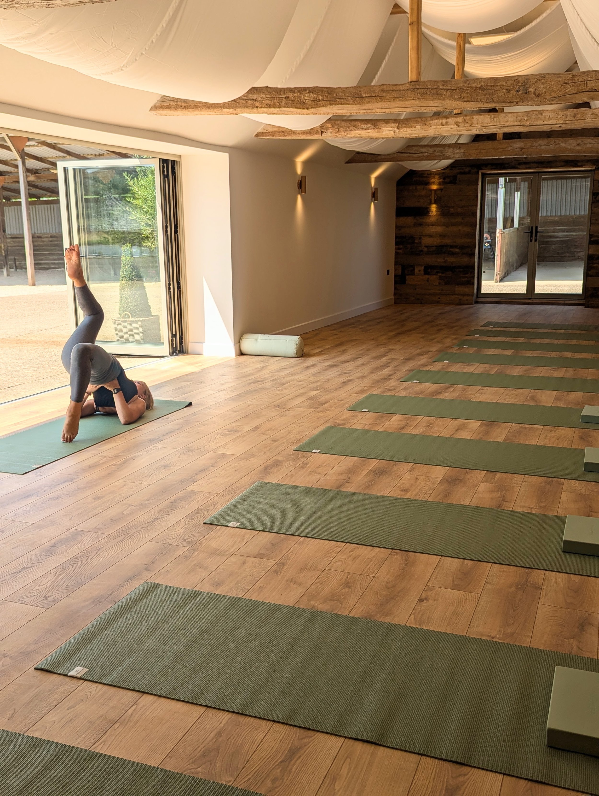 The Stables Studio, wellness space with yoga mats laid out