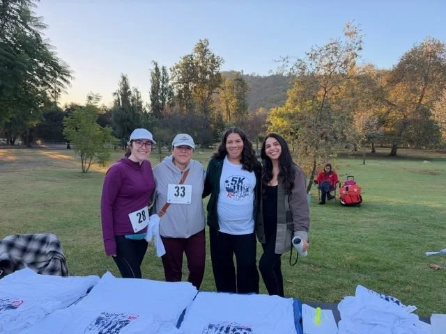 Volunteers at the event shirt table
