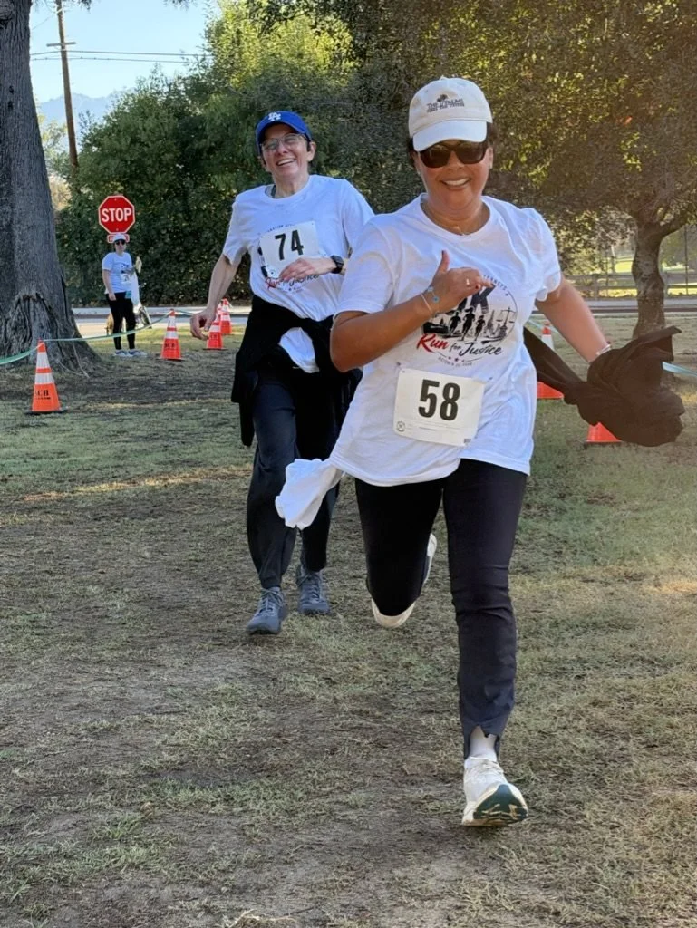A runner sprints toward the finish line