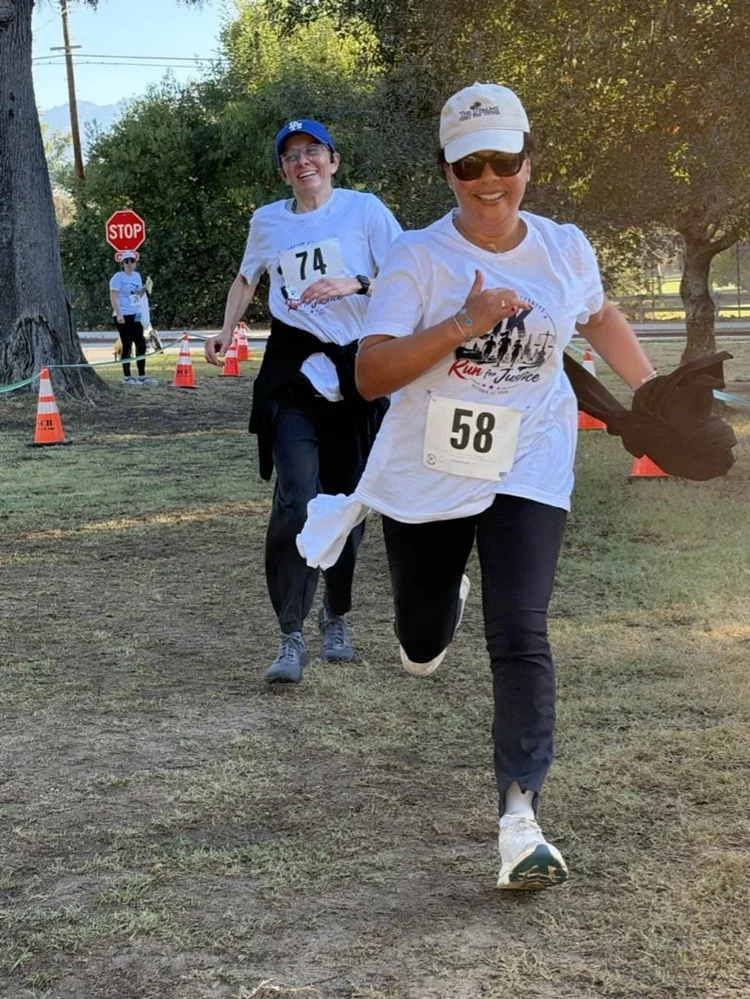 A runner sprints toward the finish line