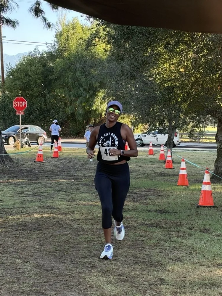 A runner heads toward the finish line