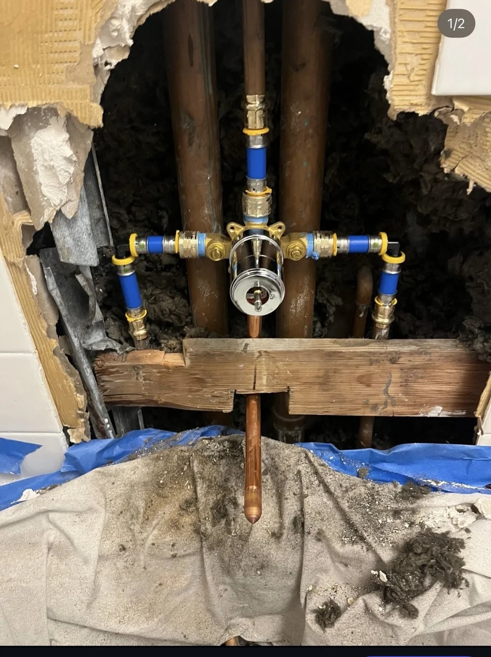 Emergency PEX pipe repair in progress