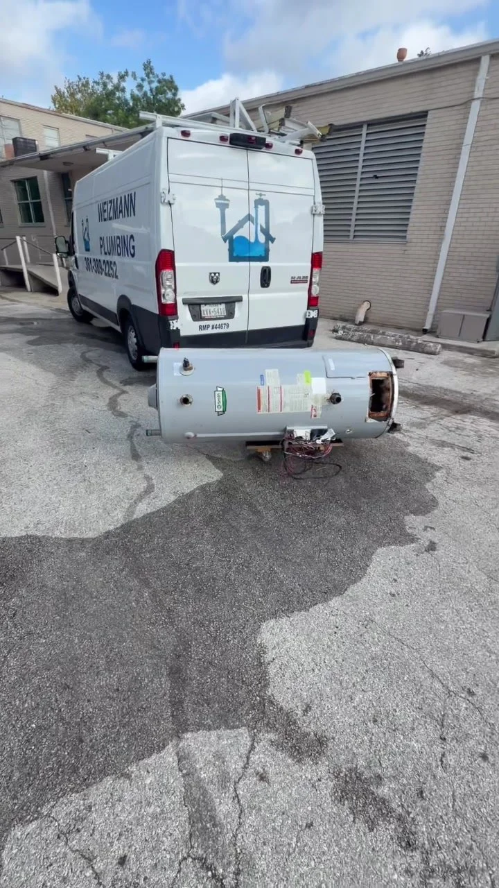 Old water heater being replaced