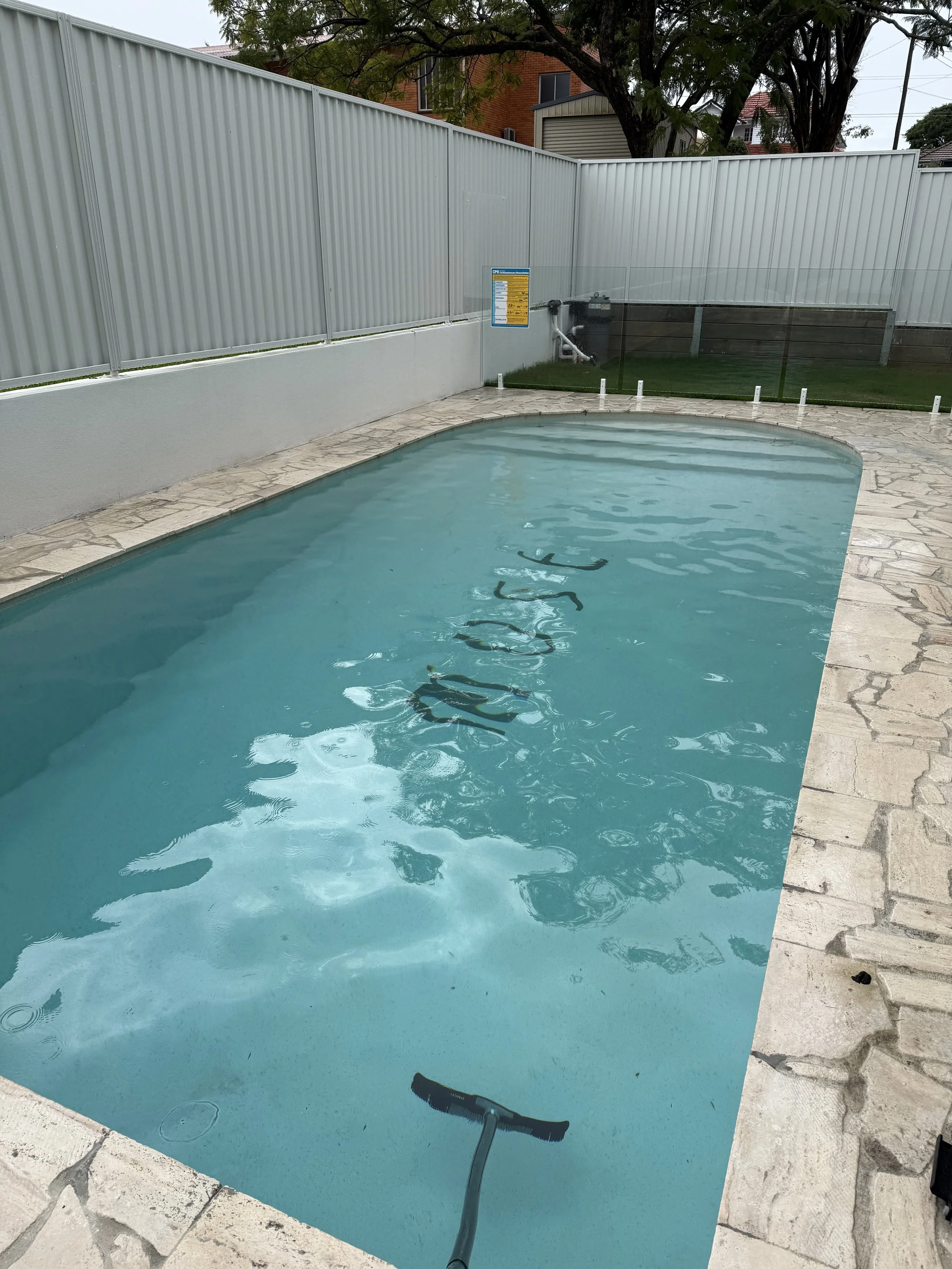 The same pool vacuumed and clear