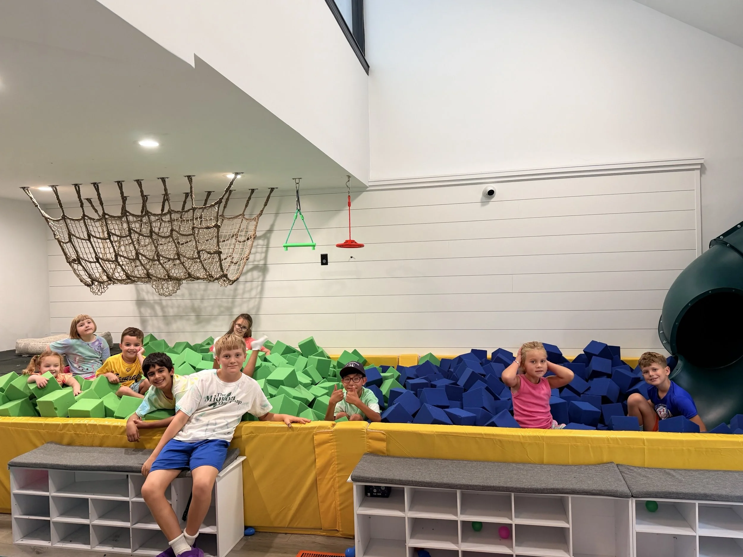 A group of kids in the foam pit at The Clubhouse Phoenixville