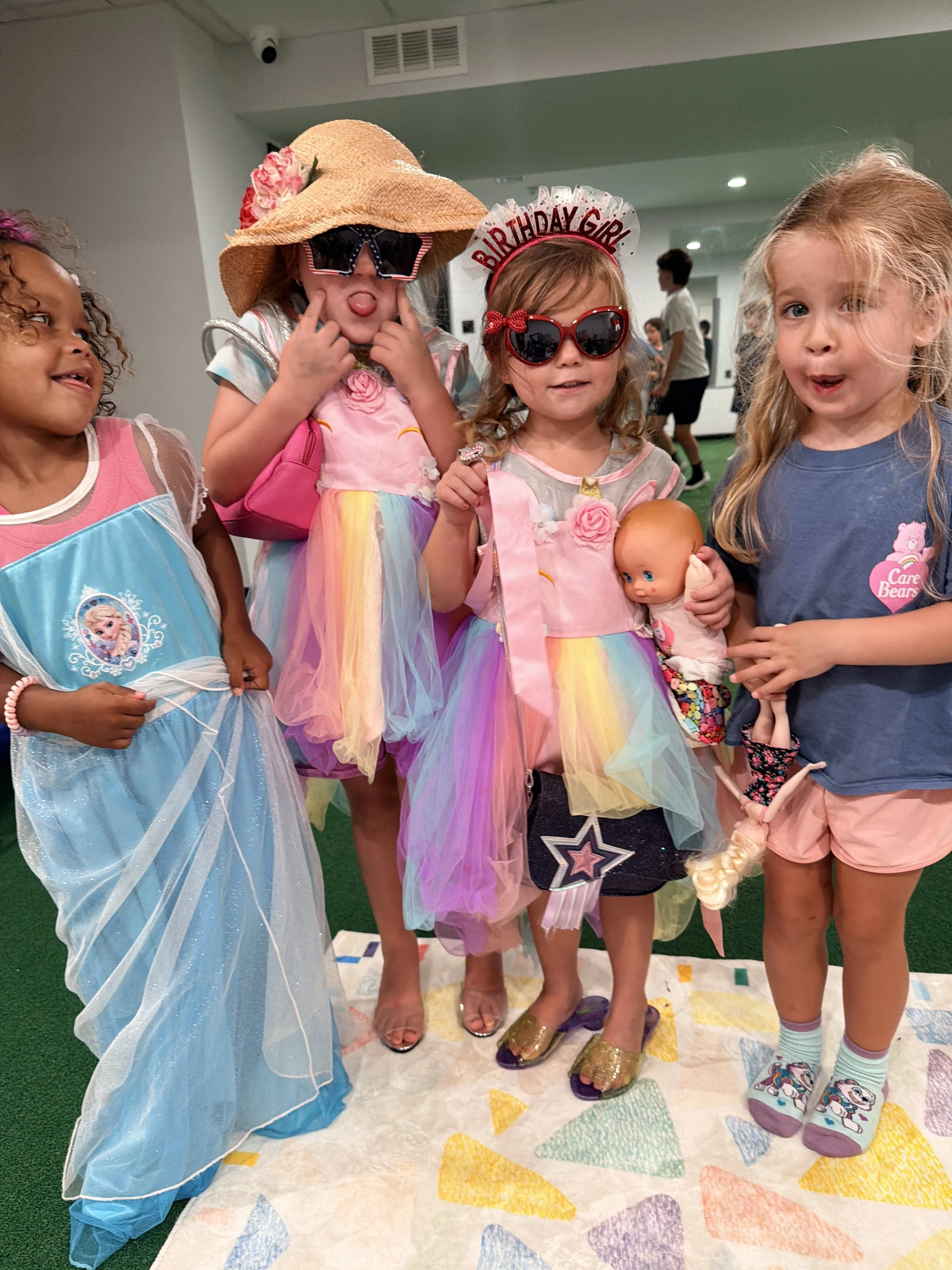 Kids playing dress-up together at The Clubhouse