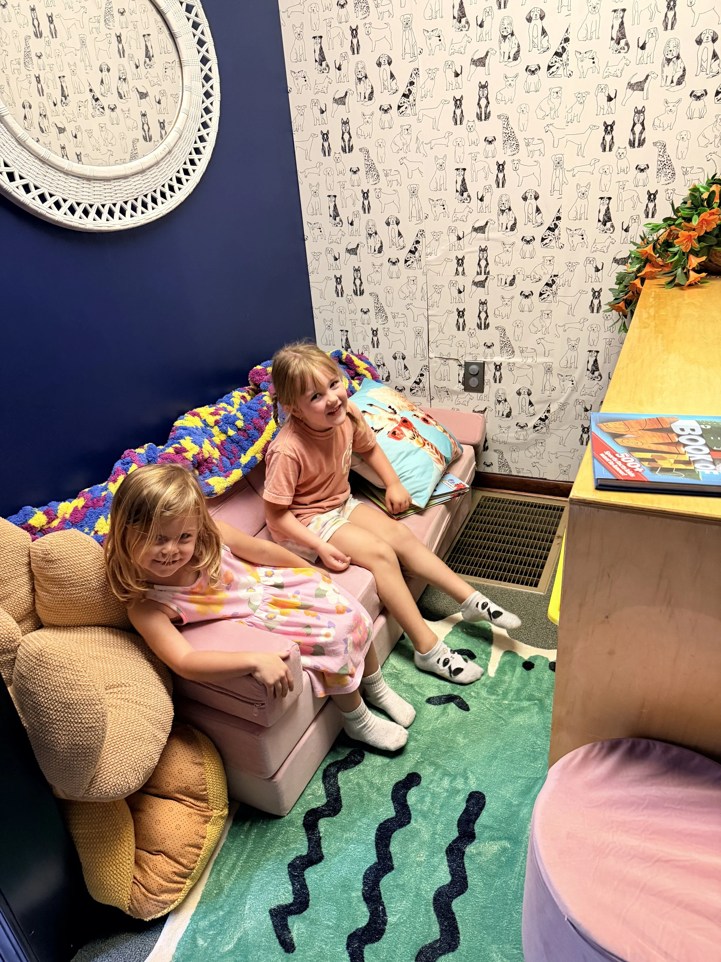 Kids reading in the cosy book nook at
      The Clubhouse Phoenixville