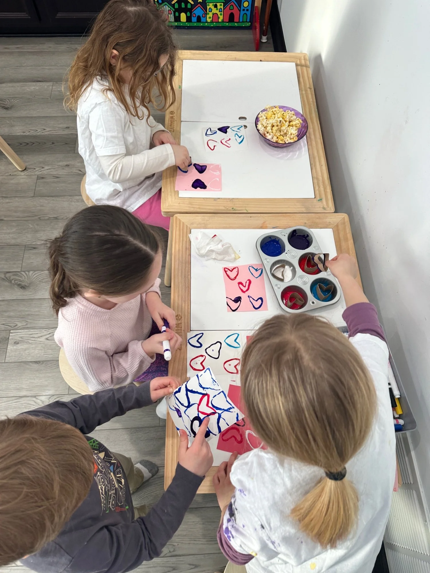 Kids heart stamp art project at enrichment class in Chester County