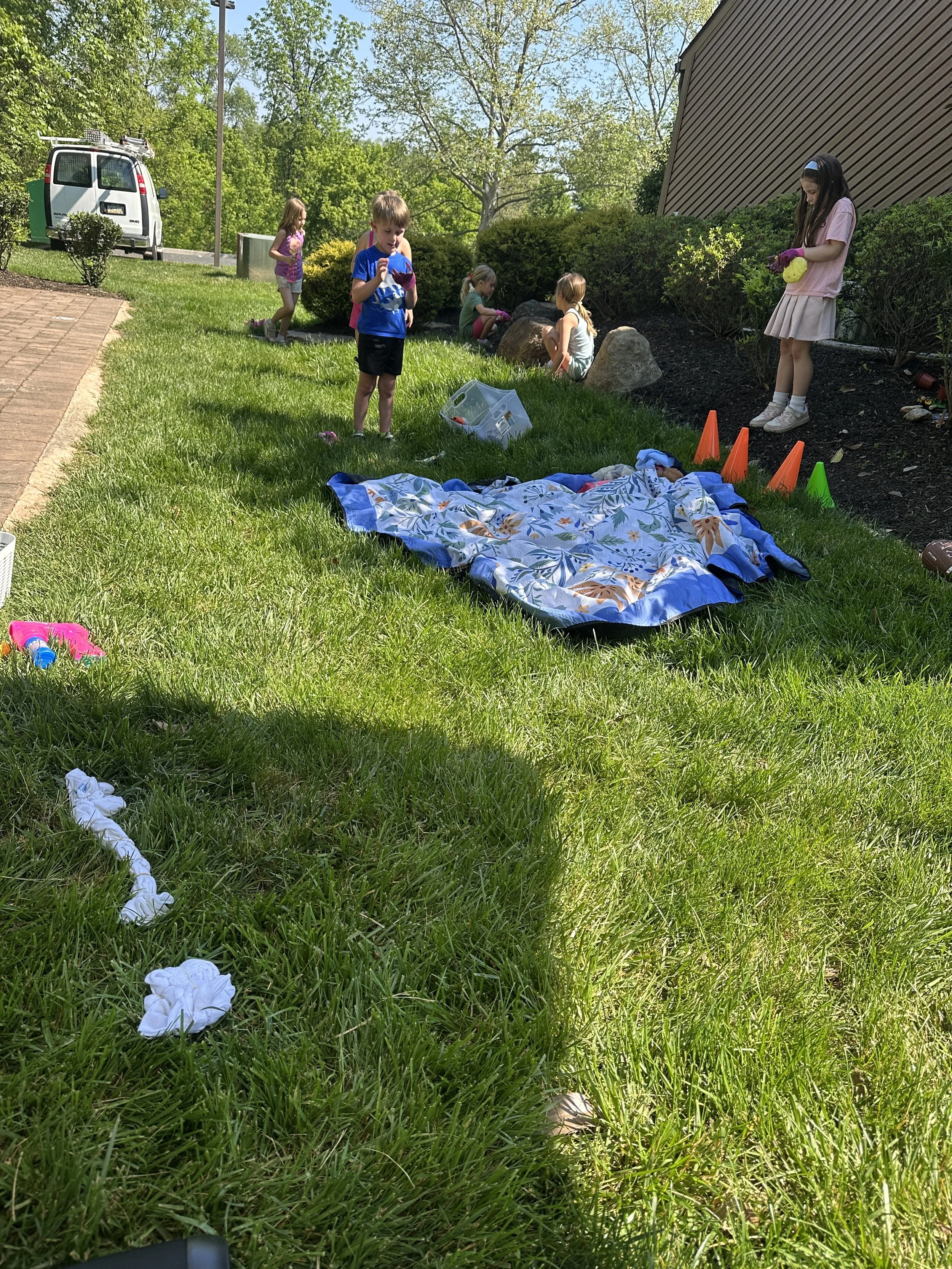Kids doing outdoor summer camp activities at The Clubhouse Phoenixville PA