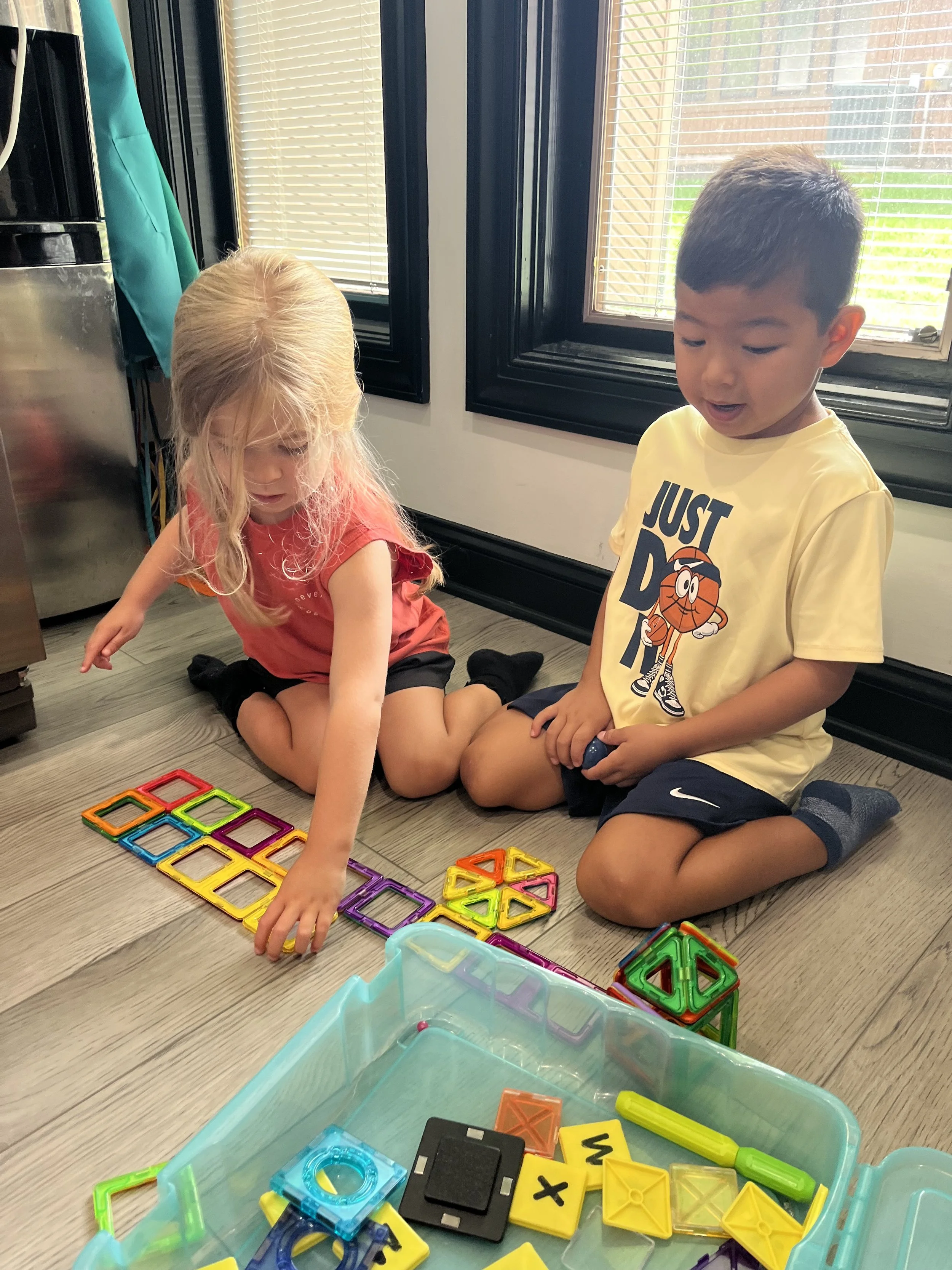 Children building with magnetic tiles
      at The Clubhouse Phoenixville