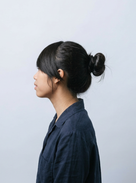 Yuan Su, shown in profile