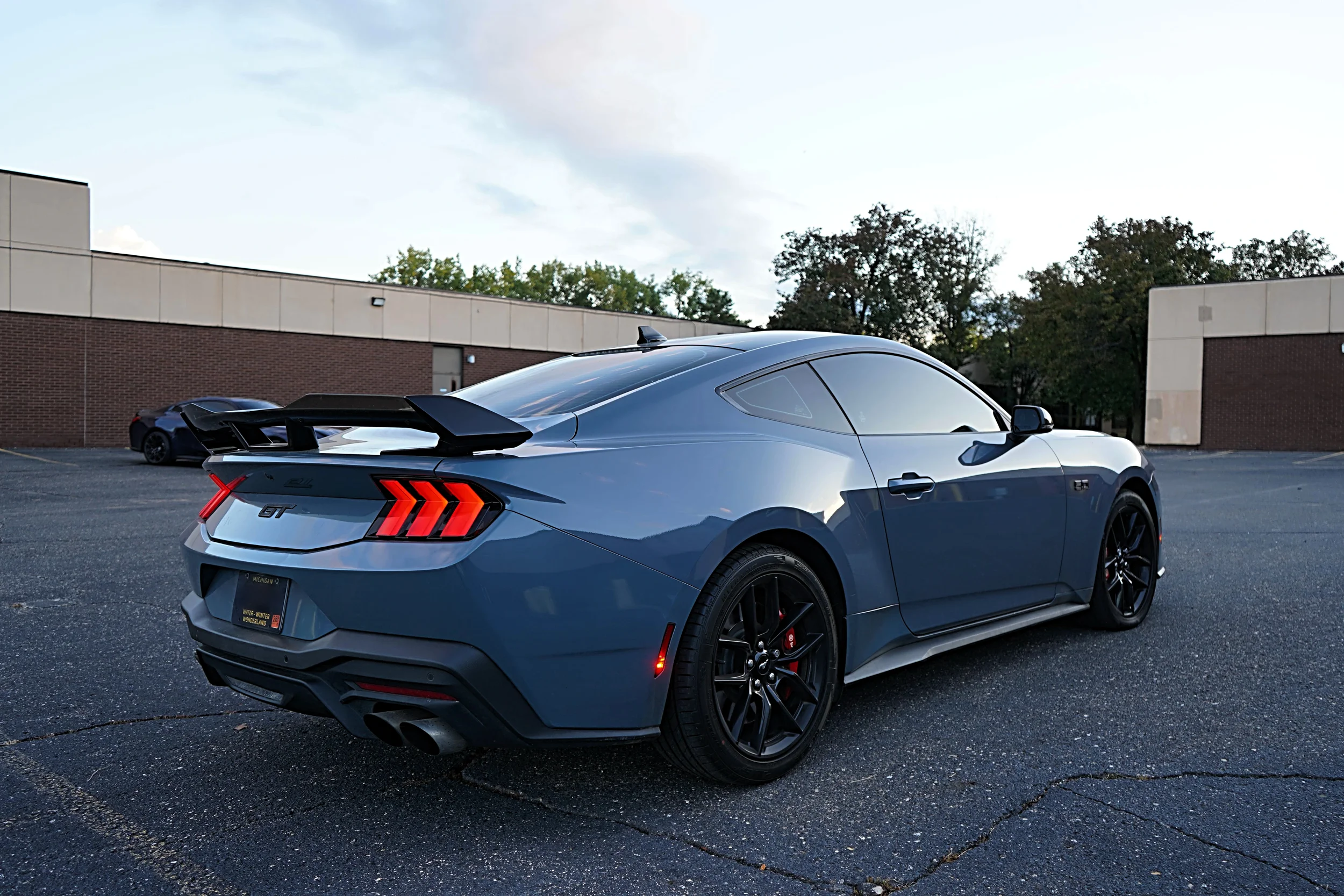 Rear three-quarter view of the 2024 Ford Mustang GT