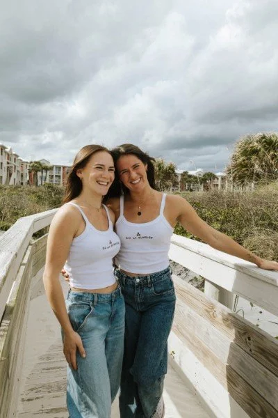 Maggie and Tessa together on the St. Augustine beach boardwalk